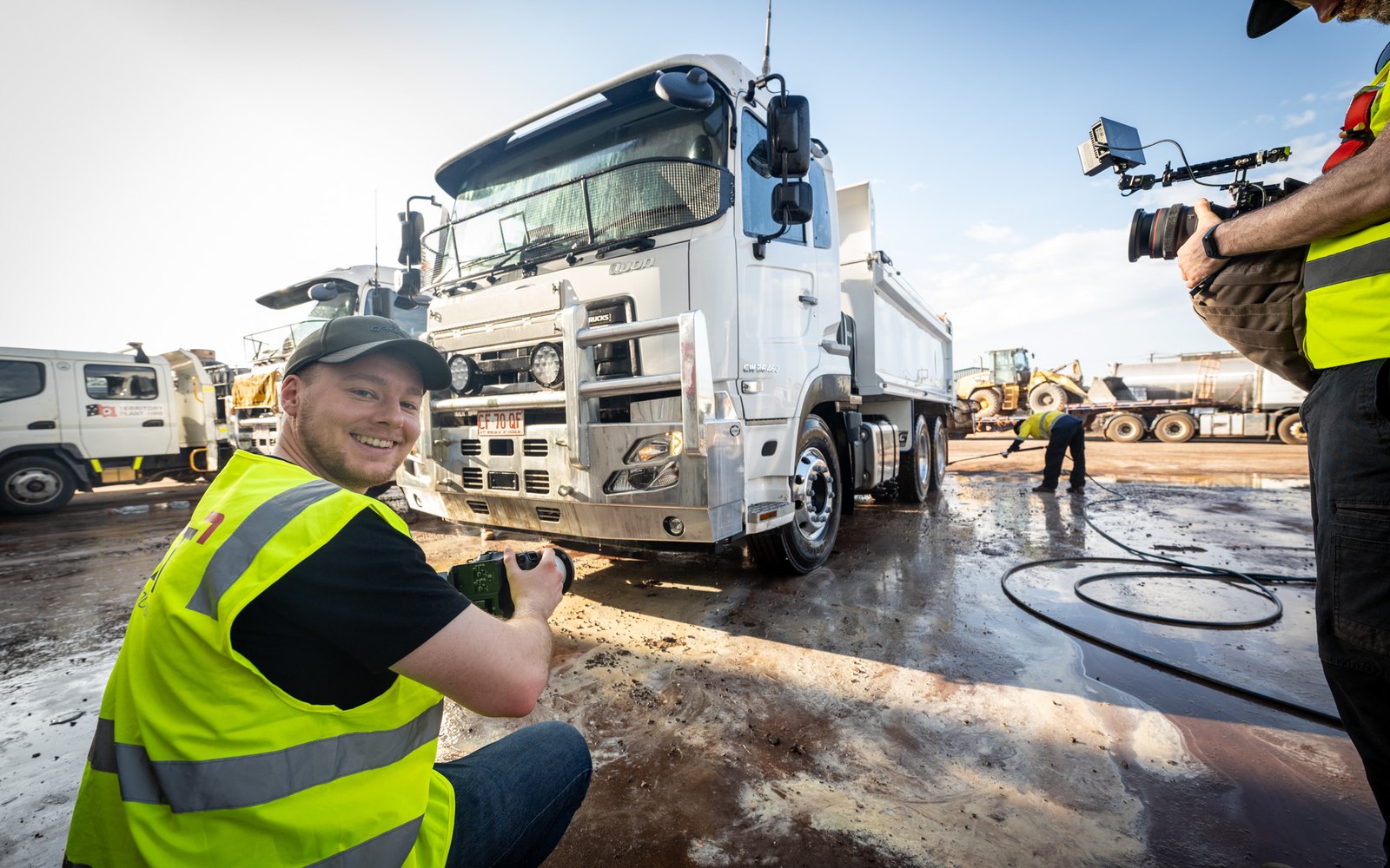 Jock from Lift filming a UD Trucks tipper being washed down at the FJ Bitumen yard