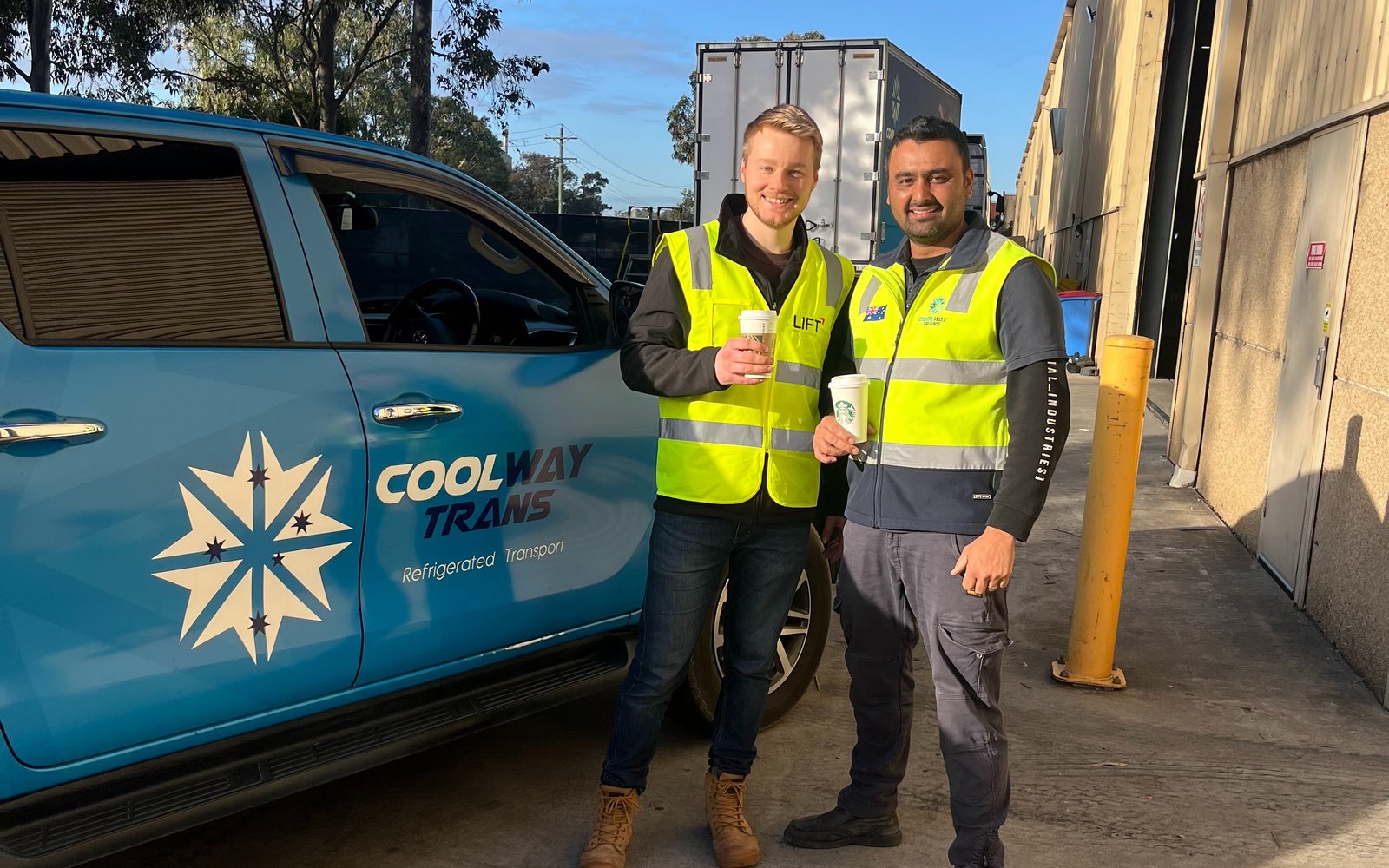 Grant from Lift with Sunny Ahmed of Coolway Trans beside a Coolway ute